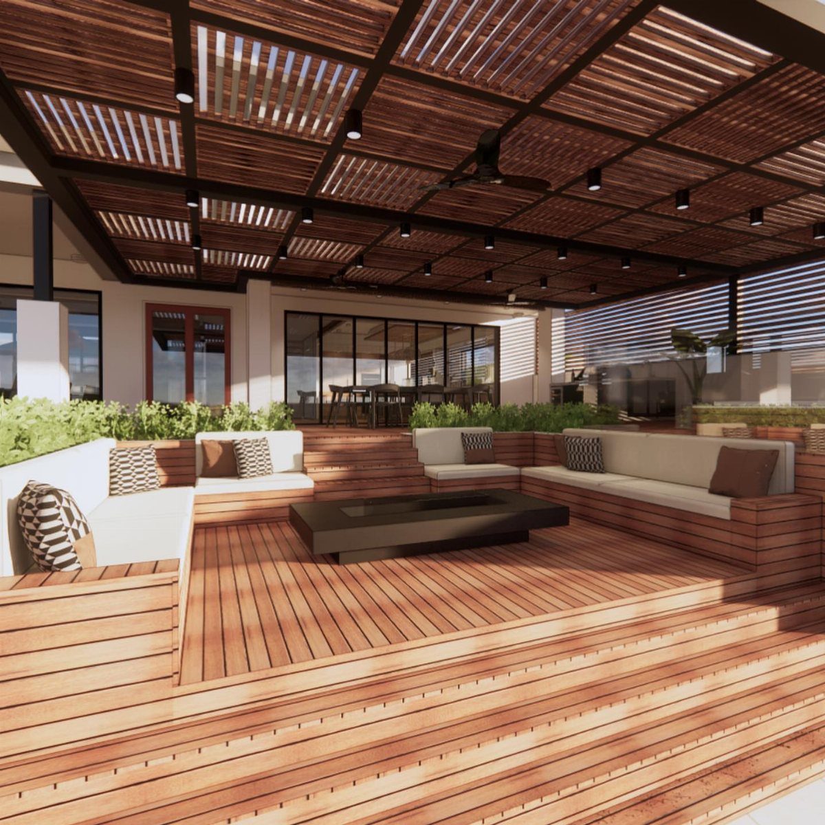 Large wooden multi-level deck with built-in white seating and a slatted pergola ceiling.